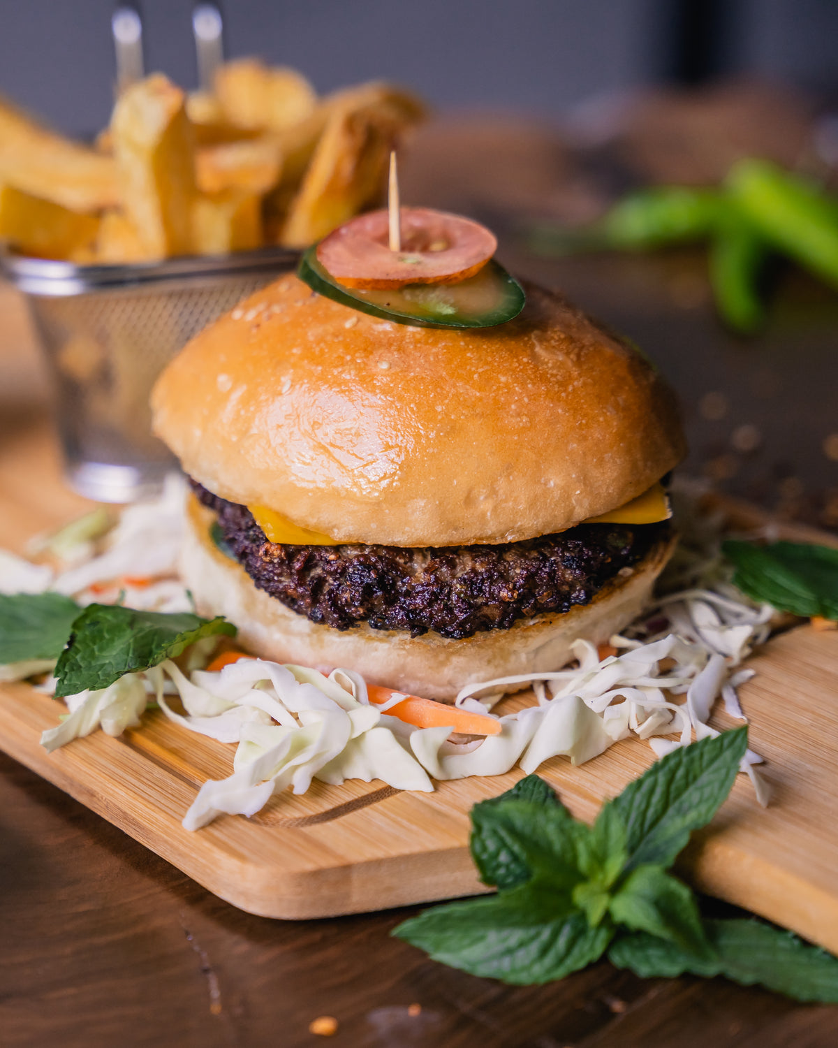 The Shire’s signature Yak Burger with fries and vegetable garnish
